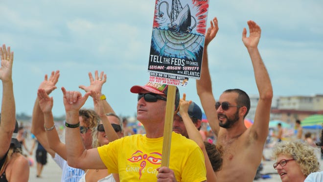 Terry Bernard was one of about 75 people attending a January “Hands Across the Sand” event at Lori Wilson Park in Cocoa Beach. He and others took a stand against offshore drilling and offshore seismic testing.