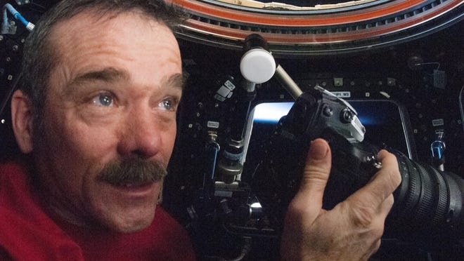 Chris Hadfield shoots photos of the Earth from the International Space Station.