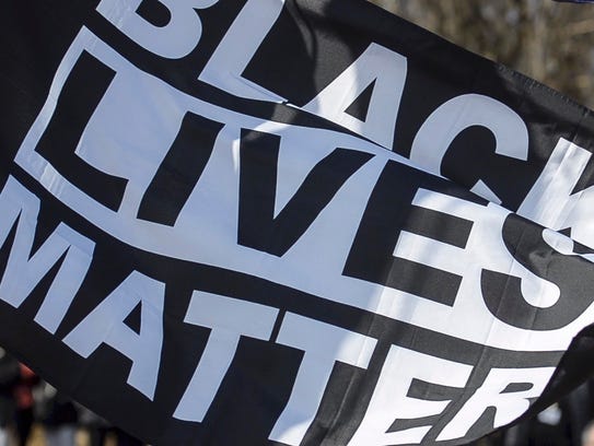 A Black Lives Matter Flag was raised outside Burlington