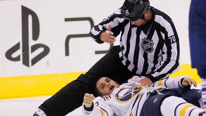 Buffalo Sabres forward Corey Tropp suffered a broken jaw and a concussion in a preseason fight.