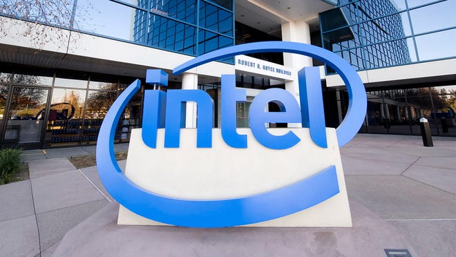 Large, blue Intel logo in the form of a sculpture in a plaza at the company's headquarters.