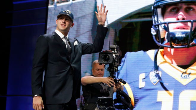 Jared Goff waves after being selected by the Los Angeles Rams.