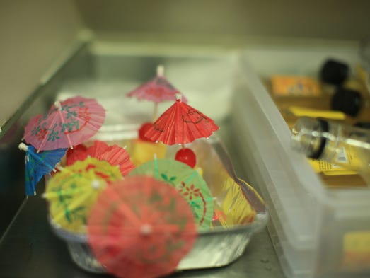 Tiny umbrellas await their Mai Tais aboard United Airlines'