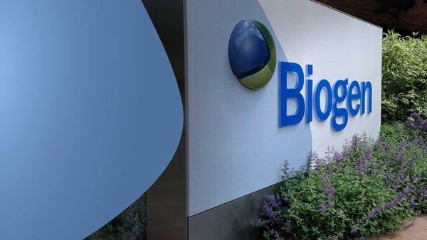 Sign with Biogen name and logo on it, with landsca