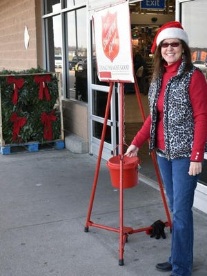 Julie Wallace with the Morganfield Lions club, is shown at the kettle the day after Thanksgiving.