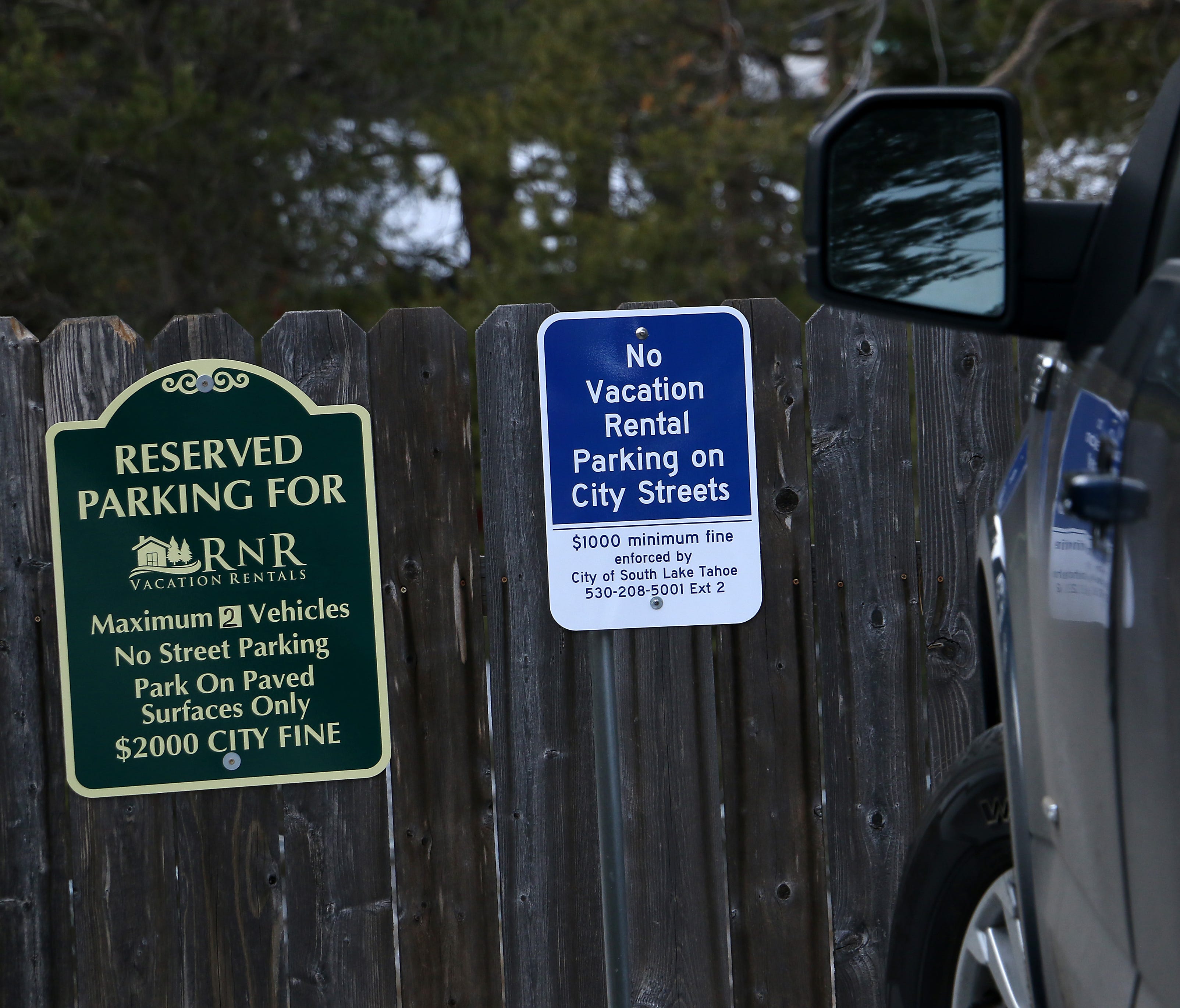 Parking restriction signs are seen at one of RnR Vacation Rentals' properties in South Lake Tahoe on Feb. 20, 2018.