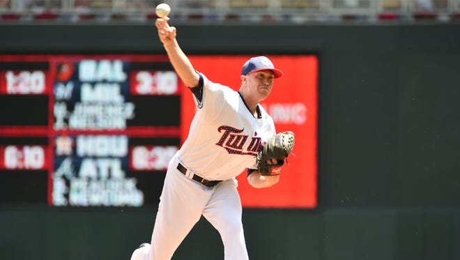 Minnesota Twins starter Kyle Gibson delivers a pitch to the Los Angeles Angels in the first inning of a baseball game, Tuesday July 4, 2017, in Minneapolis.