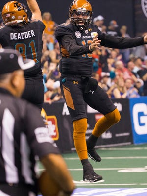 Rattlers' Nick Davila and Chase Deadder (81) celebrate a touchdown pass against the Steel at Talking Stick Resort Arena on June 11, 2016 in Phoenix, Ariz. 
