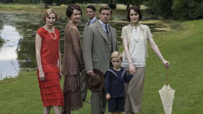 Laura Carmichael as Lady Edith, from left, Elizabeth McGovern as Cora, Countess of Grantham, Matthew Goode as Henry Talbot, Allen Leech as Tom Branson, Zac/Oliver Barker as Master George and Michelle Dockery as Lady Mary in "Downton Abbey."
