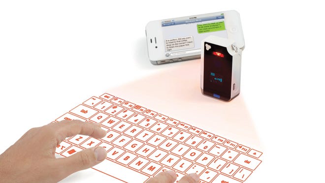 Pair any Bluetooth device with Brookstone’s Virtual Keyboard, and you can type as if there’s a real keyboard in front of you.