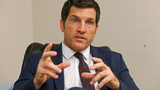 Virginia's 2nd District Congressman Scott Taylor speaks during an interview in his campaign office in Virginia Beach.