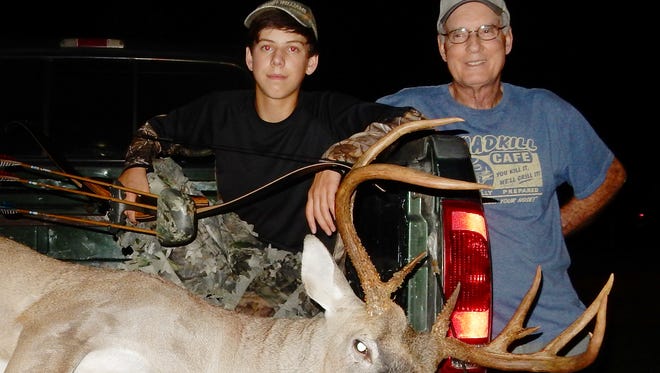 Pictured with his grandfather Richard Hanks, Lee Hanks, 16, of Vicksburg harvested a 144-inch buckafter taking up traditional archery.                              