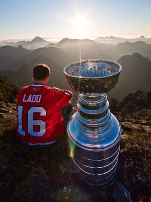 Andrew Ladd spends his day with the Stanley Cup atop Crown Mountain, British Columbia. in 2010.