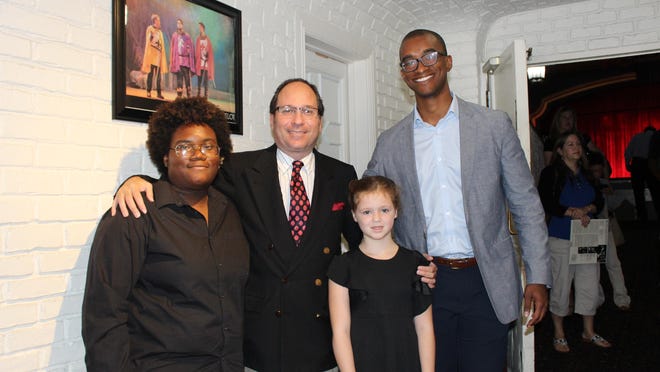 Legacy Scholarship winners Makaylah McCray (left) and Sarah Zarazua (third from left) are joined by Legacy Foundation's Jon Lappin (second from left) and Justis Cousins, committee review member. A total of $26,200 was awarded to the young musicians, according to Lappin, founder, president and executive director of the foundation.