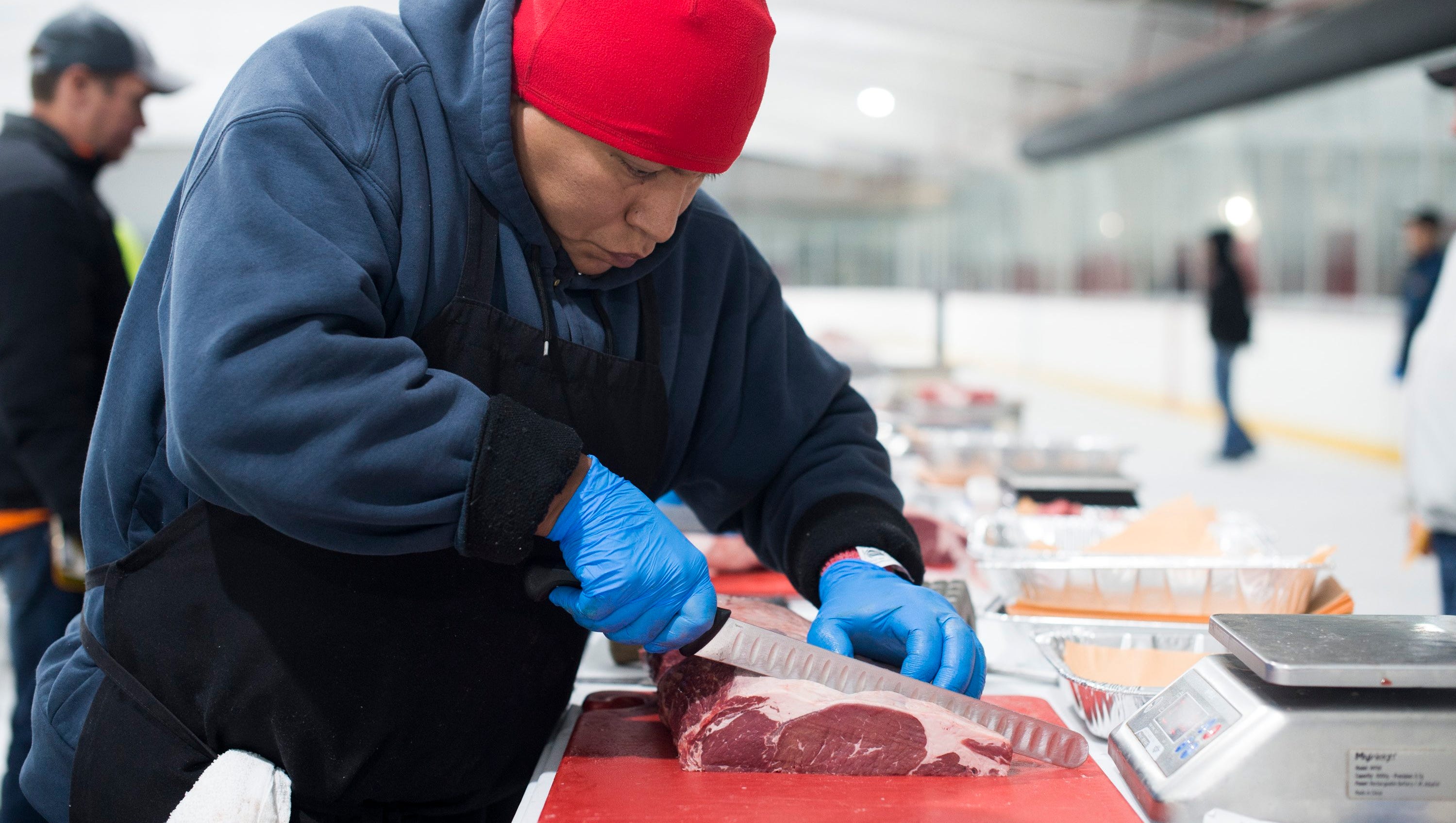 Meat cutters battle with knives, beef on Fraser hockey rink