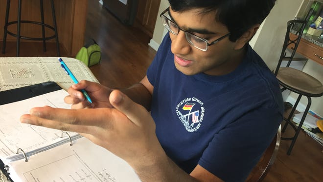Carmel High School senior Nikhil Raghuraman works on his college-level calculus homework on April 11, 2017. Nikhil is one of three students worldwide who earned a perfect score on the AP Calculus BC test this year.