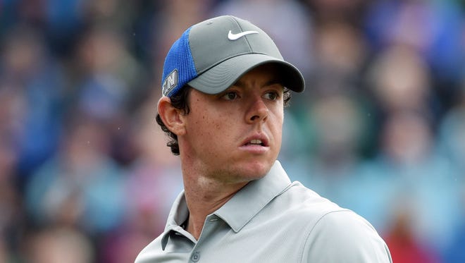 Rory McIlroy watches his tee shot at the 4th during his third round at The 143rd Open Championship at the Royal Liverpool Golf Club.  McIlroy has a six-shot lead heading into Sunday's final round.