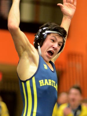 Hartland's Wyatt Nault reacts after winning a match against Brighton in the teams' dual wrestling meet on Jan. 10, 2018.