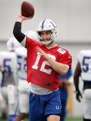 Indianapolis Colts quarterback Andrew Luck throws at practice for the first time since December.
