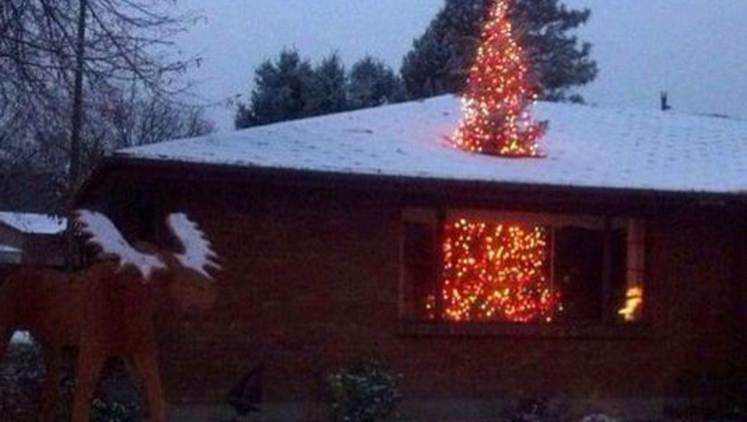 Christmas tree 'busting' through roof is a hit