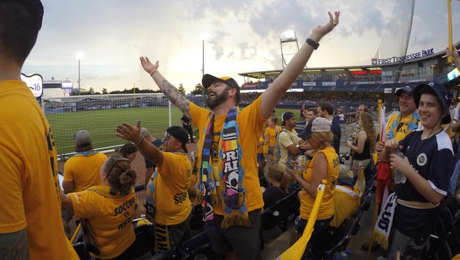 Newton Dominey, the president of Nashville SC supporters' group The Roadies, leads the crowd in chants prior to the start of the June 16, 2018 game against North Carolina. Nashville would go on to win the game 1-0.