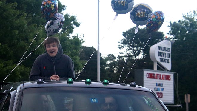 Alex Heath of Wellfleet enters the parking lot of the Wellfleet Drive-In Sunday evening for the Nauset Regional High School celebration of the graduating class of 2020. Graduation is planned for July 30 at the high school stadium. For the names of the other members of the class of 2020 see page A8.