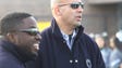 Penn State head coach James Franklin, right watching
