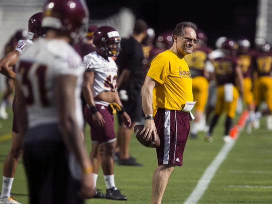 ASU defensive coordinator Phil Bennett looks on during