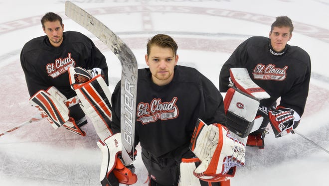 Sophomore David Zevnik, from left, sophomore Jeff Smith and freshman Zach Driscoll are vying to replace Charlie Lindgren as starting goalie for the St. Cloud State University Huskies. They were photographed Wednesday at Herb Brooks National Hockey Center.