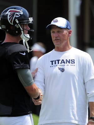 Titans coach Ken Whisenhunt greets Falcons quarterback Matt Ryan before a joint practice at the Falcons training facility on Aug. 4.