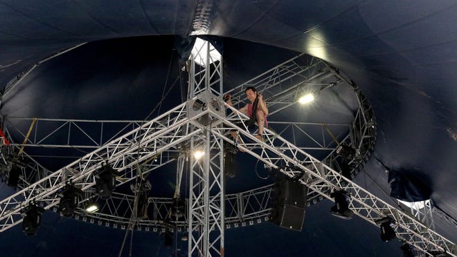 Sound technician Luciano Dresdner helps set up the big top, Tuesday, June 30, 2020, for the Cirque Italia Water Circus opening scheduled for July 2, 2020, in the Central Mall parking lot. According to the Cirque Italia website, the Water Circus Silver show features a custom designed, 35,000 gallon water stage that performers dazzle over while thrilling the audience with curtains of rain and fountain jets crisscrossing in time to each move. Showtimes are July 2-3 at 7:30 p.m.; July 4 at 1:30 p.m., 4:30 p.m., and 7:30 p.m.; and July 5 at 1:30 p.m., 4:30 p.m. and 7:30 p.m. Tickets start at $10, and one free child admission is included with the purchase of an adult ticket. For more information, visit www.cirqueitalia.com.