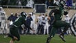 Michigan State's Matt Coghlin and Brian Lewerke react