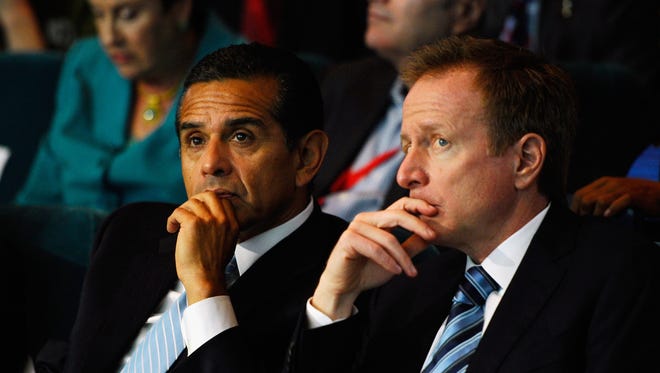 Then-Los Angeles Mayor Antonio Villaraigosa, left, and then-First Deputy Mayor and Chief Executive for Economic and Business Policy Austin Beutner during an event announcing naming rights for the new football stadium Farmers Field at Los Angeles Convention Center on Feb. 1, 2011, in Los Angeles.