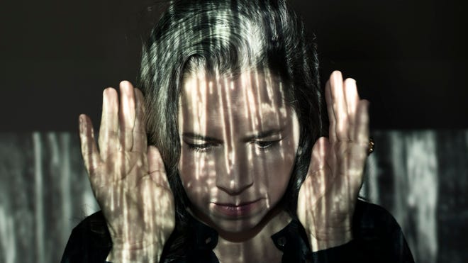 This CD cover image released by Nonesuch Records shows the self titled album by Natalie Merchant.