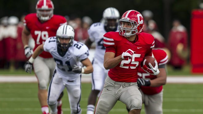 Senior running back Luke Hagy, shown in 2012 during Cornell’s homecoming victory over Yale, rushed for 100 yards in each of the Red’s final three games a season ago and is one of four captains this year.