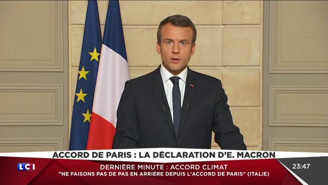 A video grab from the French TV channel LCI taken on June 1, 2017, shows French President Emmanuel Macron speaking during a live broadcast in Paris, after US president Donald Trump announced the United States was to pull out of the 2015 Paris climate accord.
President Donald Trump declared June 1, 2017, that the United States will withdraw from the 2015 Paris accord and try to negotiate a new global deal on climate change.