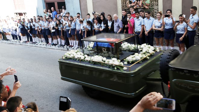The Caravana de la Libertad, or the Caravan of Freedom, transports Fidel Castro's ashes through the town of Matanzas, Cuba, on Wednesday, Nov. 30, 2016. Wednesday marks the first day of the cross-country caravan that started in Havana and will end in Santiago on Saturday, with the funeral to be held Sunday.