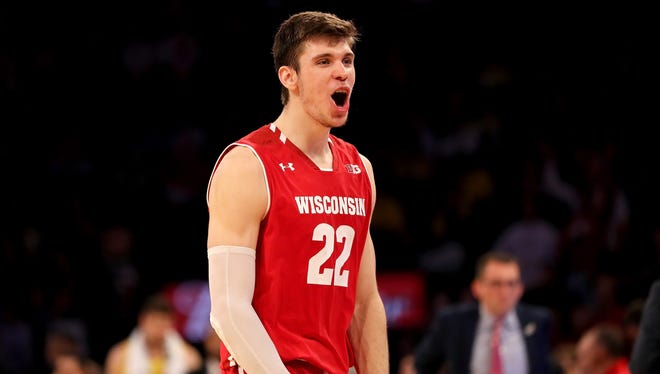 Ethan Happ of the Badgers celebrates the 59-54 win over the Terrapins.