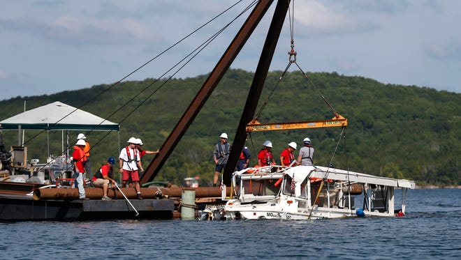The duck boat that sank last week on Table Rock Lake killing 17 people was raised from the bottom by crews on Monday, July 23, 2018.