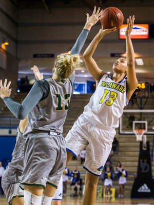 Delaware's Sade Chatman puts up a shot over George Mason's Bridget O'Donnell in the first half of Delaware's 67-51 win over George Mason at the Bob Carpenter Center in Newark on Sunday afternoon.