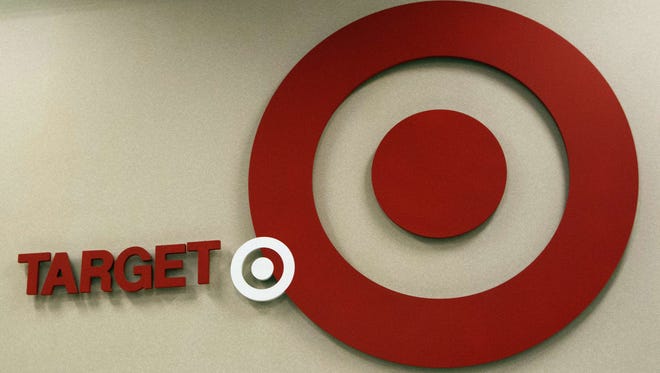 The Target logo is seen at a store in Stamford, Conn.  The retailer with the bull's-eye as a logo says it does not want customers carrying guns in its stores, even if it is legal.