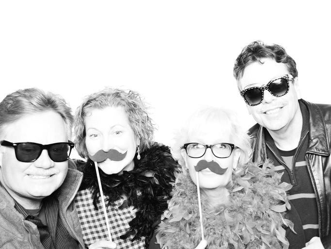 Guests pose in the MINT photobooth Feb. 28 at The Yorktowne