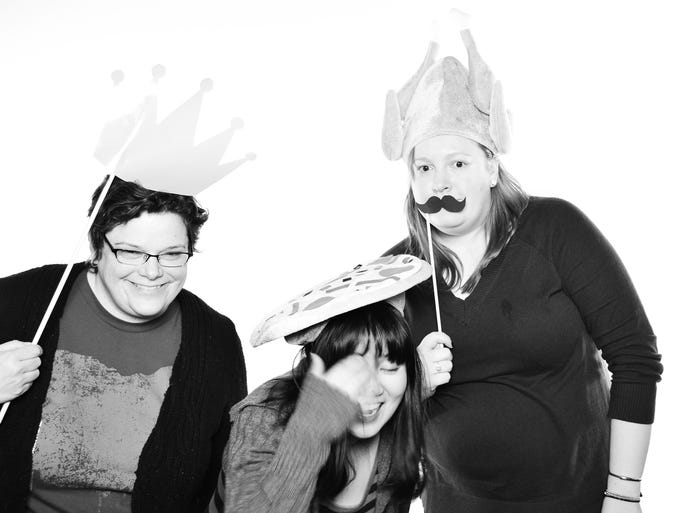 Guests pose in the MINT photobooth Feb. 28 at The Yorktowne