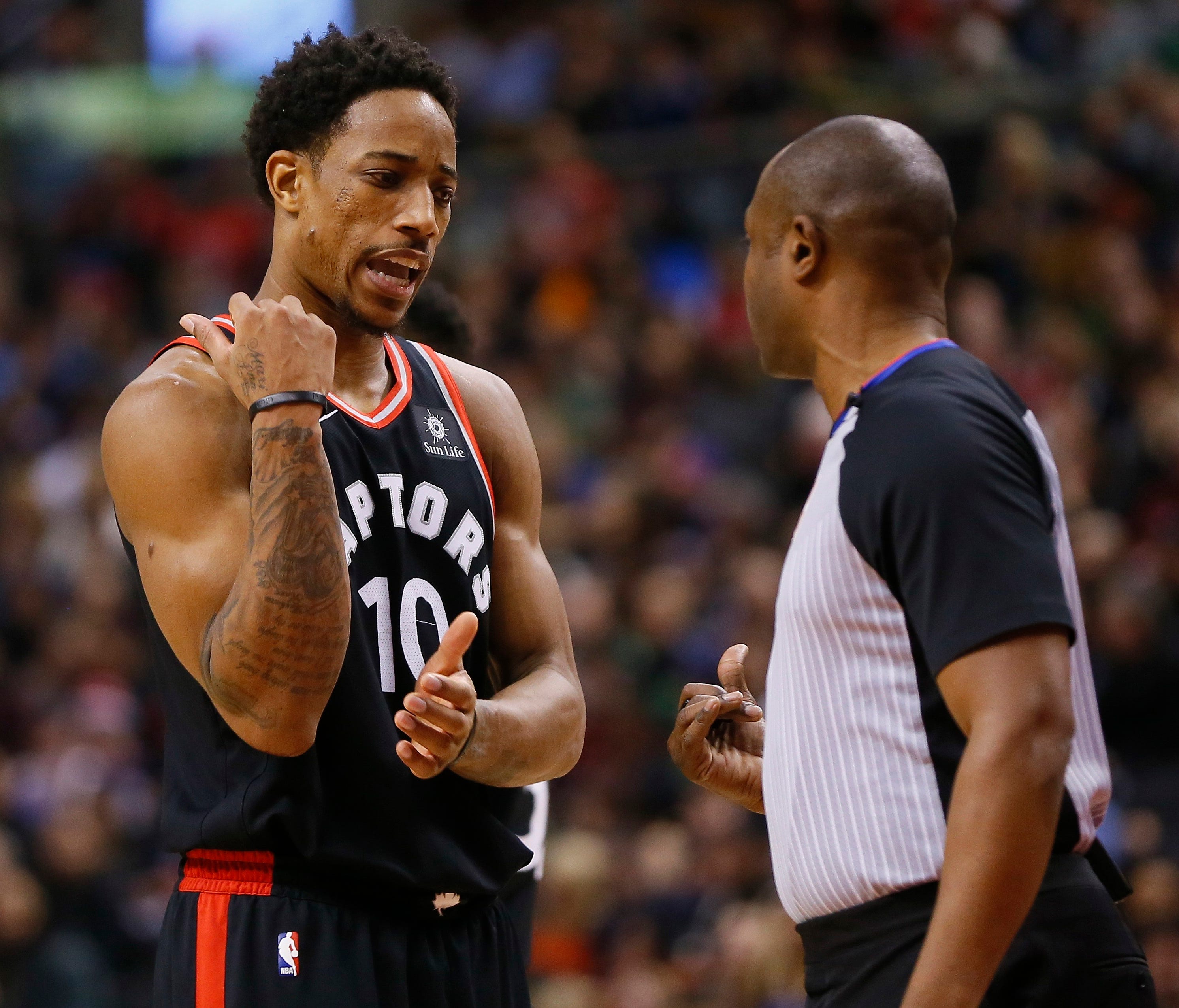 DeMar DeRozan pleads his case with an official.