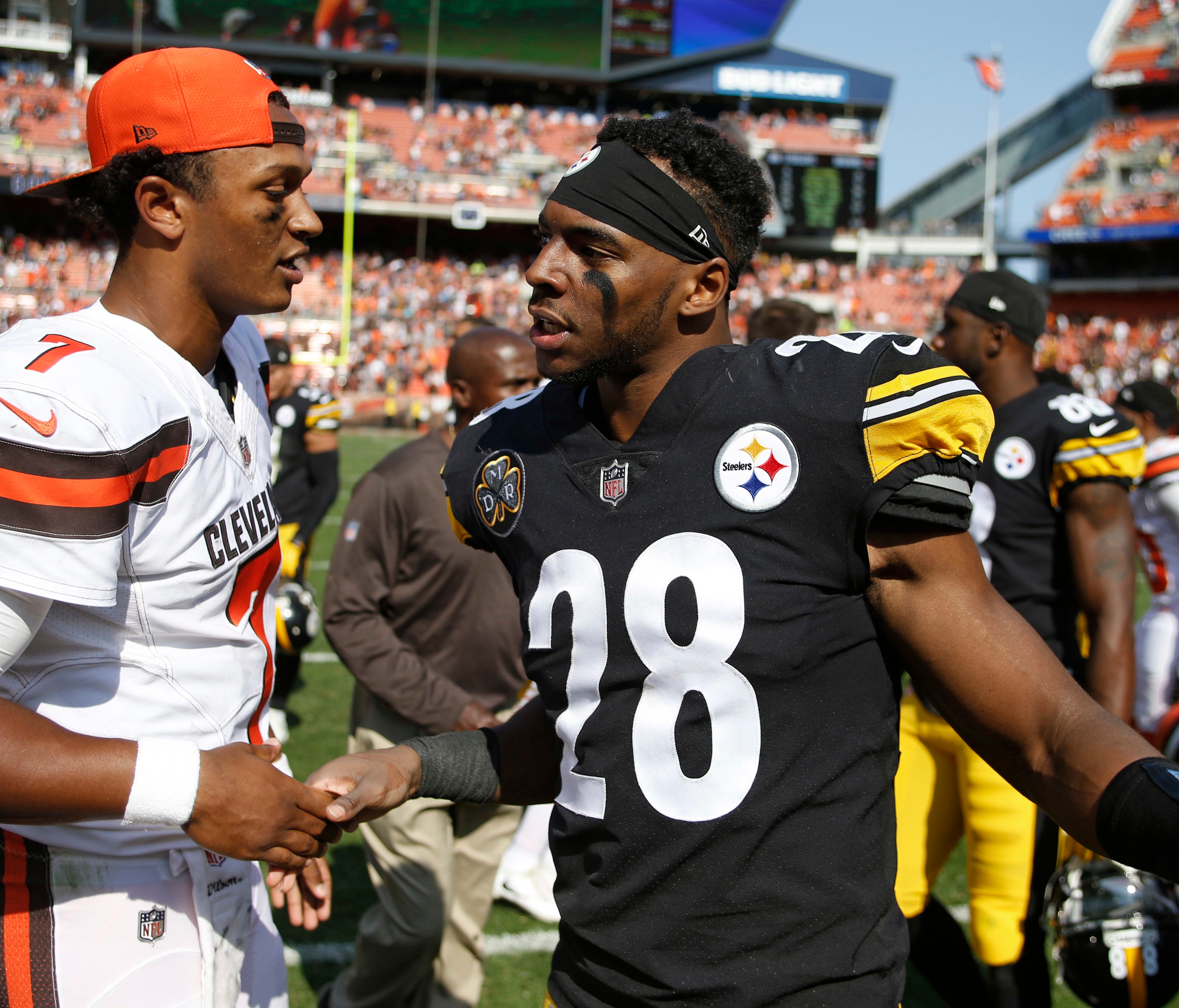 Cleveland Browns quarterback DeShone Kizer (7) greets Pittsburgh Steelers strong safety Sean Davis (28) after an NFL football game, Sunday, Sept. 10, 2017, in Cleveland.