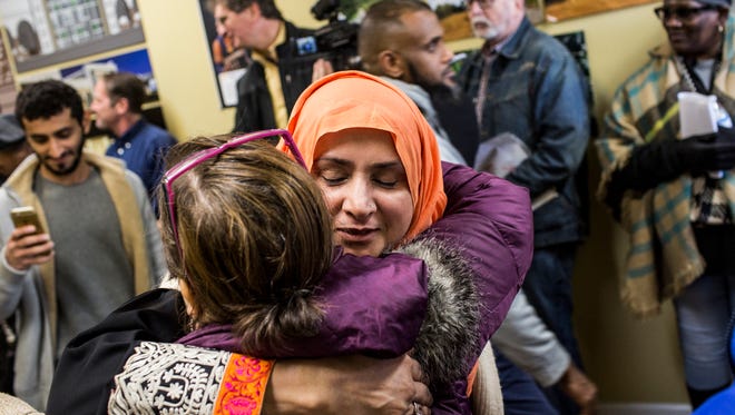 Khairunissa Shaikh (right), hugs Davina Hawkins after Friday afternoon prayers at the Memphis Islamic Center in Cordova. "Everyone needs to stand up for freedom of religion," said Hawkins who, along with other members of Heartsong church, visited to show their support of the neighboring Memphis Islamic Center.