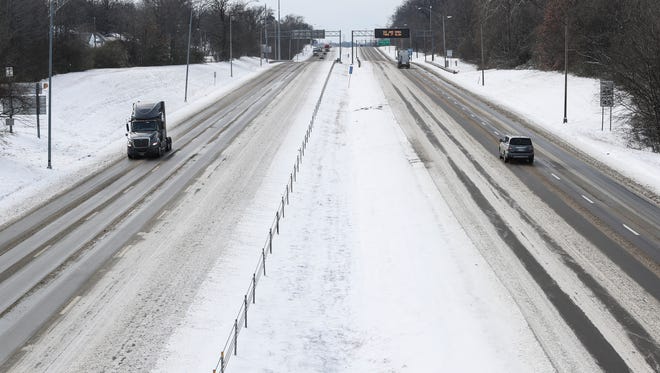 January 16, 2018 - Cars and trucks move slowly along Interstate 55 on Tuesday morning. The second snowstorm in four days moved into the Memphis metro area Monday night and by early Tuesday morning snowfall blanketed the area, delighting students with closed schools and creating headaches for drivers on slippery roadways. 