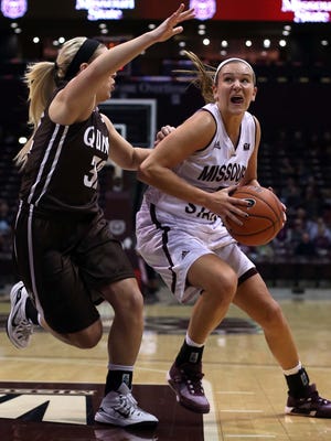 The Missouri State Lady Bears' Liza Fruendt drives to the basket against Quincy's Sarah Schumacher at JQH Arena in Springfield on November 8, 2015.