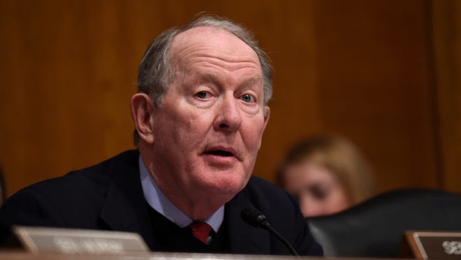 U.S. Sen. Lamar Alexander, a Tennessee Republican and chairman of the Senate education committee, joined 24 other GOP lawmakers in ridiculing federal agencies over their guidance for local school districts on which bathrooms transgender students may use.