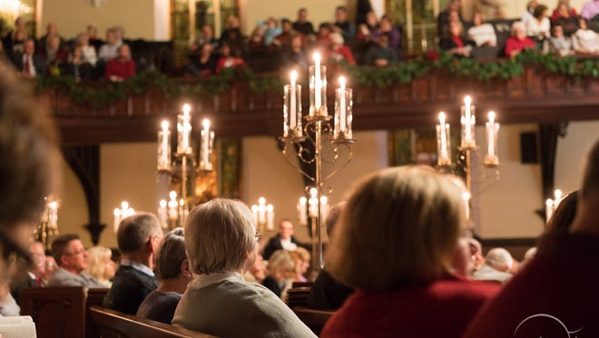 Patrons listen to the Evansville Philharmonic perform Handel's "Messiah" at the 2015 concert.